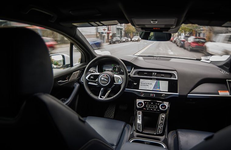 Interior of a driverless Waymo Jaguar I-PACE in motion